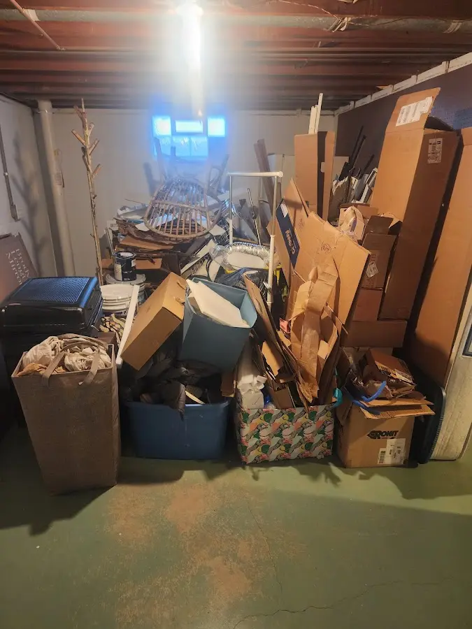 Roll-off dumpster container at job site for Yard Waste Dumpster Rental in Walker